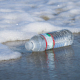 Image of a water bottle on the shore